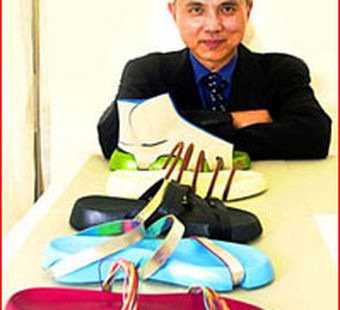 Британская королева наградила дизайнера обуви Джимми Чу